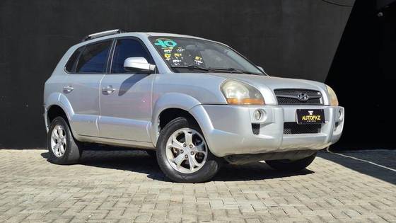HYUNDAI TUCSON 2.0 MPFI GL 16V 142CV 2WD GASOLINA 4P AUTOMÁTICO HYUNDAI TUCSON 2.0 MPFI GL 16V 142CV 2WD GASOLINA 4P AUTOMÁTICO